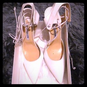 White Manolo Blahnik strapped pump